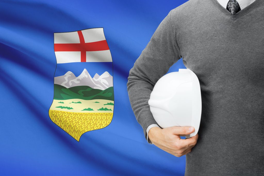 Engineer with flag on background series - Alberta